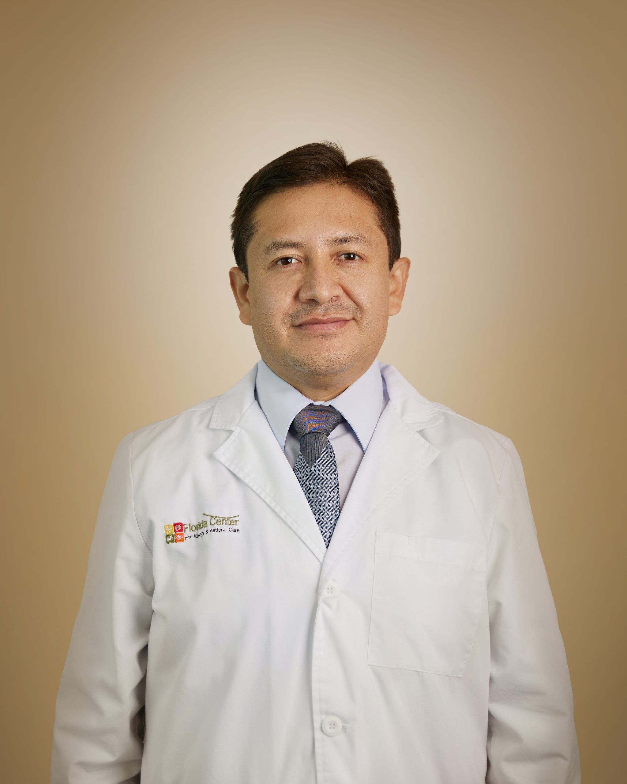 Jose E. Rojas Camayo, MD